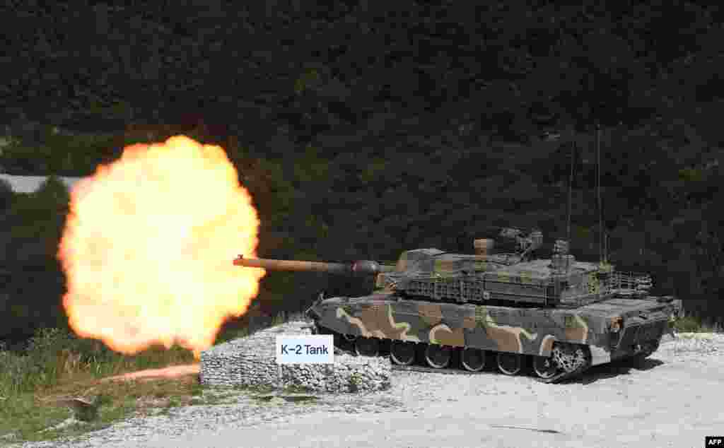 A South Korean K2 tank fires during a live-fire demonstration for a media preview of the Defense Expo Korea 2018 at Seungjin Fire Training Field in Pocheon, 65 kilomters northeast of Seoul.