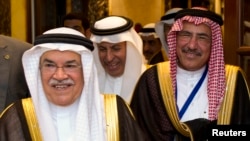 FILE - Saudi Arabian Oil Minister Ali Al-Naimi (L).