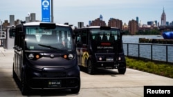 FILE - Optimus Ride launches a self-driving car at the Brooklyn Navy Yard in the Brooklyn borough of New York City, Aug. 5, 2019.