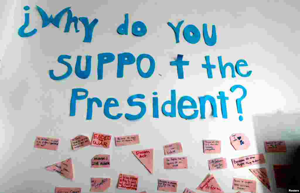 A sign hangs on the wall at an "Obama for President" office in Denver, Colorado October 30, 2012. 