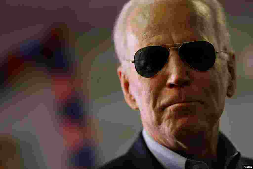 Democratic 2020 U.S. presidential candidate and former Vice President Joe Biden talks with volunteers and supporters as he visits a campaign office in Des Moines, Iowa, U.S., Feb. 3, 2020.