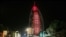 FILE - A sign reading "UAE Chinese Week" in Chinese and Arabic is projected onto the Bus Al Arab luxury hotel to celebrate the UAE Chinese Week in Dubai, July 18, 2018.