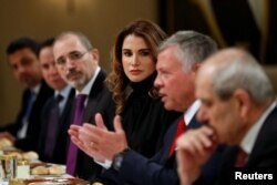 Jordan's King Abdullah and wife Queen Rania are seen during their meeting with U.S. Vice President Mike Pence and wife Karen Pence (not pictured) at the Royal Palace in Amman, Jordan, Jan. 21, 2018.