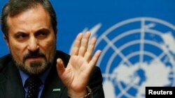 Louay Safi, spokesperson for the Syrian National Coalition, addresses a news conference at the United Nations European headquarters in Geneva, Feb. 14, 2014. 