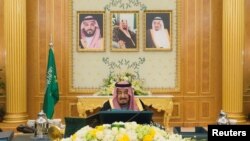 FILE - Saudi Arabia's King Salman bin Abdulaziz Al Saud presides over a cabinet meeting in Riyadh, Saudi Arabia, Dec. 12, 2017. 