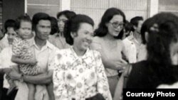 Neou Sarems says goodbye to friends at Pochentong airport.