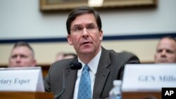 FILE - U.S. Secretary of the Army Mark Esper speaks during a House Armed Services Committee budget hearing on Capitol Hill in Washington, April 2, 2019.