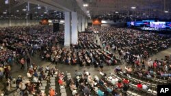 FILE - People attend the morning session of the Southern Baptist Convention annual meeting in Nashville, Tenn., June 16, 2021. Nashville health officials have linked a small coronavirus cluster to last month's SBC meeting.