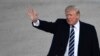 President Donald Trump waves as he walks towards Air Force One at Andrews Air Force Base in Md., Saturday, Dec. 2, 2017. Trump is heading to New York to attend a series of fundraisers. 