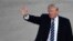 President Donald Trump waves as he walks towards Air Force One at Andrews Air Force Base in Md., Saturday, Dec. 2, 2017. Trump is heading to New York to attend a series of fundraisers. 