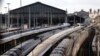 This photograph shows trains parked at platforms as traffic has been stopped at the Gare du Nord station in Paris on March 7, 2025