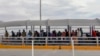 Migrants from Cuba, Venezuela and Central America queue at the Paso del Norte International Bridge in Ciudad Juarez, Chihuahua State, Mexico, to cross the border and request political asylum in the United States, on Jan. 9, 2019. 