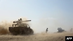 Saudi-backed government troops repel a Huthi rebel offensive on oil-rich Marib, some 120 kilometres (75 miles) east of Yemen's rebel-held capital Sanaa, on Feb. 14, 2021.