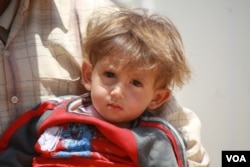 Morhaf's mother, Aziza Ghazawi says all of her six children are in poor health since the war began, at the Za'atari camp in Jordan, June 17, 2015. (Photo: H. Murdock / VOA)