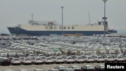 French fishing boats block the entrance to the port of Saint-Malo as fishermen protest post-Brexit fishing rights.