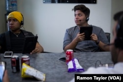 17-year-old Wilfredo Villeda, right, volunteers with The Libre Initiative, making phone calls in support of dreamers like himself.