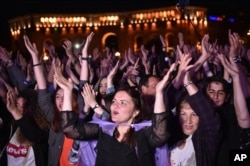 Armenians gather in the capital Yerevan's Republic Square as they wait for Nikol Pashinyan, May 7, 2018.