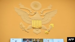 Amazon CEO Jeff Bezos (top,c), Facebook CEO Mark Zuckerberg (top, r), Google CEO Sundar Pichai (bottom, l), and Apple CEO Tim Cook are sworn-in before the House Judiciary Subcommittee on Antitrust, Commercial and Administrative Law, July 29, 2020.