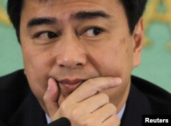 FILE - Former Thai Prime Minister Abhisit Vejjajiva attends a news conference at the Japan National Press Club in Tokyo.