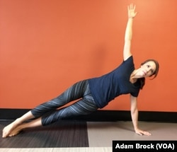 This is the advanced Side Plank pose. It improves your balance and stability.
