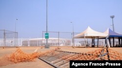 Barriers lie on the ground at the entrance of Olembe Stadium in Yaounde, Cameroon, Jan. 25, 2022. Eight people were killed and many more injured in a crush outside the stadium on Jan. 24, 2022, ahead of an Africa Cup of Nations match.