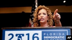 DNC Chairwoman Debbie Wasserman Schultz, D-Fla., has to speak over protesting Bernie Sanders supporters during the first day of the Democratic National Convention last month. She resigned her party position after hacked emails showed the party organization backing Hillary Clinton over Sanders for the Democratic nomination. It was supposed to be neutral. (AP Photo/Matt Slocum)