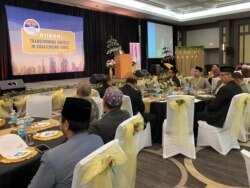 Presiden IMSA Syafrin Setiawan Murdas membuka Muktamar IMSA 2019 di Oakbrook, Illinois. (Foto: VOA/Valdya)