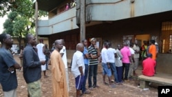 Health workers in protective suit carry a coffin of the body of a Covid-19 coronavirus patient during a burial at a cemetery in Falam township in western Myanmar&#39;s Chin state.&nbsp;