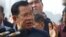 FILE - Cambodia's Prime Minister Hun Sen delivers a speech at the port of Sihanoukville, Cambodia, Friday, Feb. 14, 2020. 