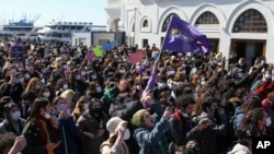 Protesters chant slogans during a demonstration in Istanbul, March 27, 2021 against Turkey's withdrawal from Istanbul Convention, an international accord designed to protect women from violence.