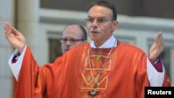 Bishop Franz-Peter Tebartz-van Elst presides over a church service in the diocese of Limburg, Sept. 9, 2013.
