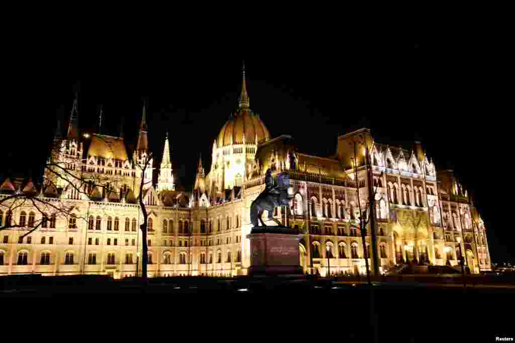 The Hungarian parliament building is seen before Earth Hour in Budapest, Hungary, March 30, 2019. 