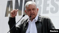 Mexico's President-elect Andres Manuel Lopez Obrador thanks supporters for his victory in the July 1 election, in Mexico City, Sept. 29, 2018. Lopez Obrador takes the oath of office Saturday.