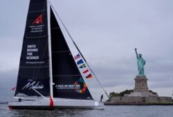 Swedish climate activist Greta Thunberg sails into New York harbor aboard the Malizia II, a zero-emissions yacht, Aug. 28, 2019.