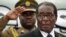 FILE - Zimbabwe President Robert Mugabe attends the launch of basic commodities in Harare, Zimbabwe.