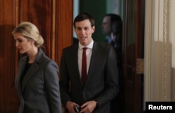 White House senior advisor Jared Kushner enters the East Room with his wife Ivanka Trump, prior to a joint news conference between President Donald Trump and Israeli Prime Minister Benjamin Netanyahu, at the White House in Washington, Feb. 15, 2017.