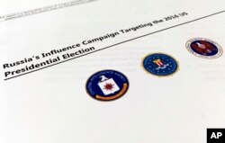 A part of the declassified version Intelligence Community Assessment on Russia's efforts to interfere with the U.S. political process is photographed in Washington, Jan. 6, 2017.