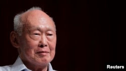 FILE - Former Singapore Prime Minister Lee Kuan Yew (LKY) smiles as he attends the LKY School of Public Policy 7th anniversary dialogue session in Singapore September 14, 2011.