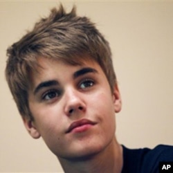 Pop star Justin Bieber gives a press conference before his concert as part of his "My World" tour in Singapore. (April 2011 file photo)