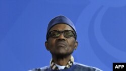 Le président nigérian Muhammadu Buhari lors d'une conférence de presse à Berlin, en Allemagne, le 14 octobre 2016.