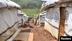 Makeshift shelters are seen at an unofficial camp for internally displaced people, who are victims of ethnic violence in Iga Barriere, Ituri province, in the eastern Democratic Republic of Congo, June 24, 2019.