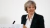 Britain’s May Lays Out Plan for Hard Brexit