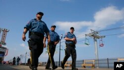 Jami'an tsaro suke sintiri a unguwar Seaside a shekara ta 2014