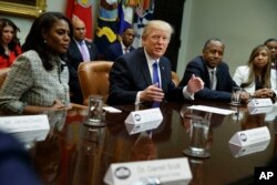 FILE - President Donald Trump speaks during a meeting on African-American History Month in the Roosevelt Room of the White House in Washington, Feb. 1, 2017.