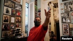 Carlos Cristobal Marquez, owner of the private restaurant San Cristobal, where U.S. President Barack Obama dined on his historic trip to Havana in 2016, gestures during an interview in Havana, Cuba, Nov. 9, 2021.