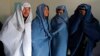 Afghan Men Don Burqas, Take to Streets for Women's Rights