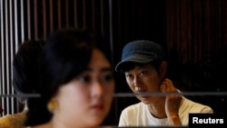 Shoji Morimoto who charges 10,000 yen ($71.30) per booking to accompany clients and simply exist as a companion in Tokyo