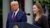 President Donald Trump walks with Judge Amy Coney Barrett to a news conference to announce Barrett as his nominee to the Supreme Court, in the Rose Garden at the White House, Sept. 26, 2020, in Washington. 