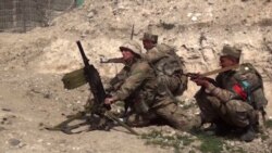FILE - An image from a video made available on the official website of the Azerbaijani Defense Ministry on Sept. 28, 2020, allegedly shows Azeri troops conducting a combat operation during clashes between Armenian separatists and Azerbaijan in Nagorno-Karabakh.