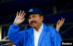 Nicaragua's President Daniel Ortega waves to supporters during celebrations to mark the 39th anniversary of the "Repliegue" (Withdrawal) in Managua, July 7, 2018.